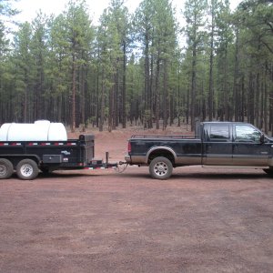 TNC_F350_KR_with_8x14_Loadtrail_Trailer_725_gallon_water_tank