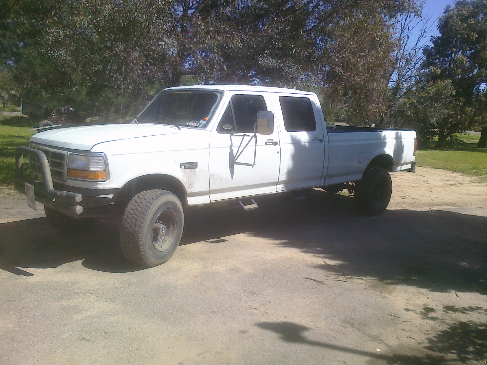 bumper, steps, and black painted wheels